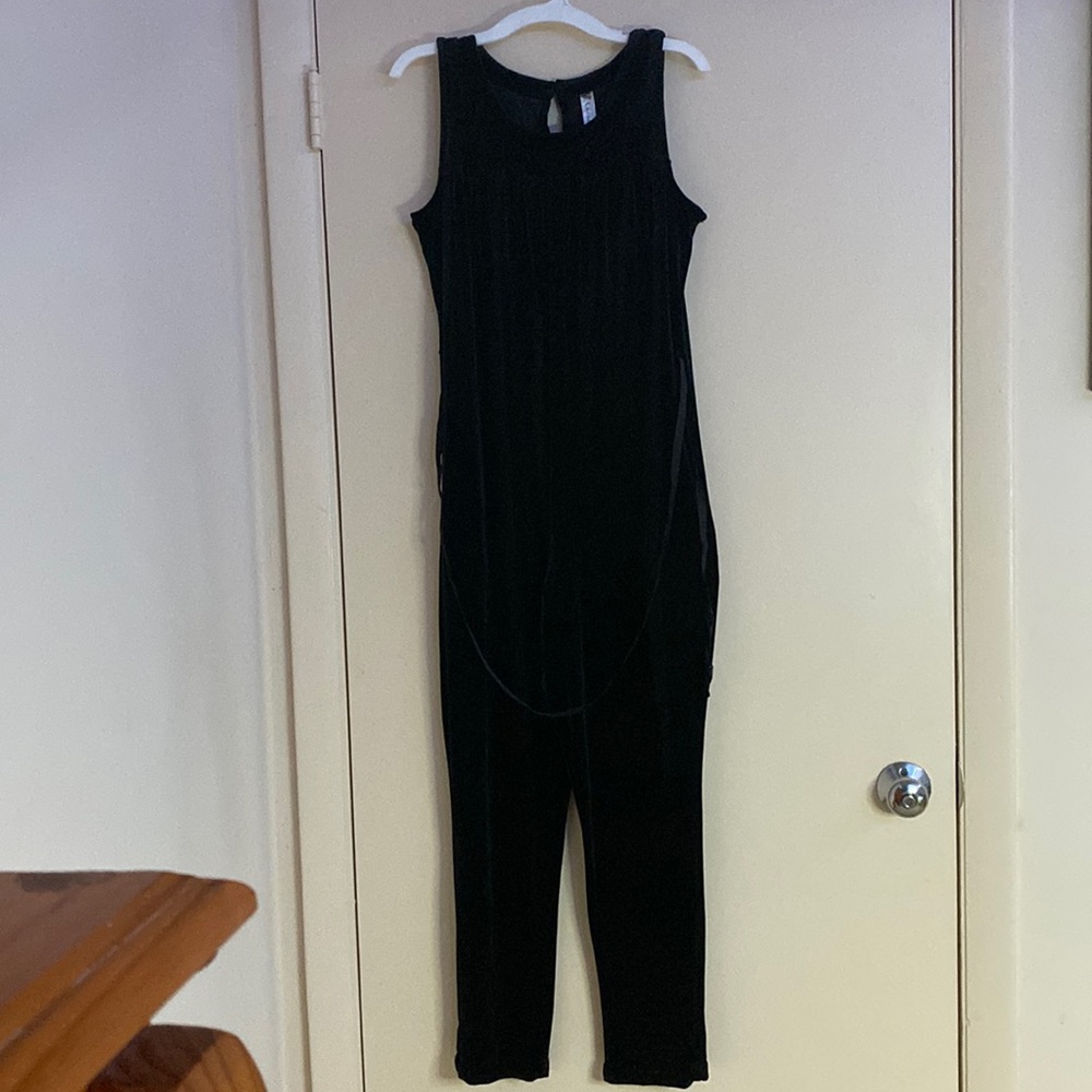 It’s black with a velour material and a glitter black attached belt